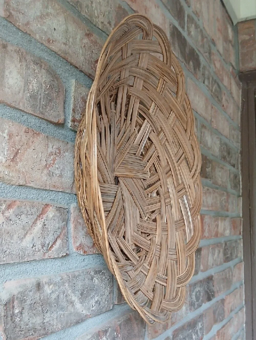 Handwoven Natural Brown Wicker Wall Basket - 14 Inch Diameter
